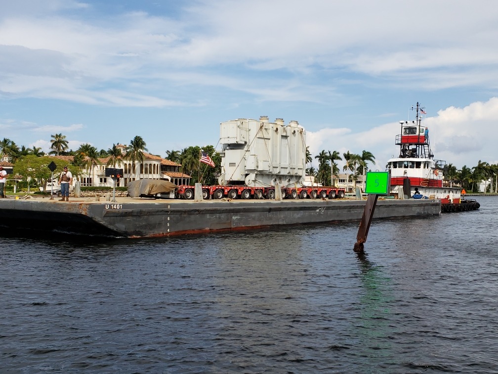 Utility barge U 1401 carrying a heavy power transformer on the New River