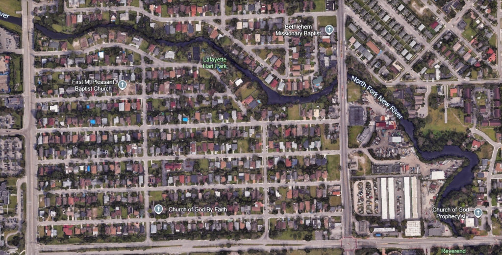 Google Earth satellite imagery showing the upper-middle North Fork river corridor from Sistrunk Blvd to 31st Ave